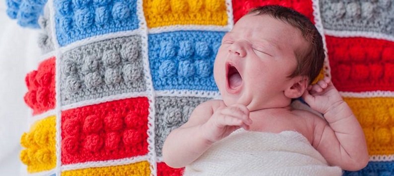 Yawning is one of the baby cues you will learn.